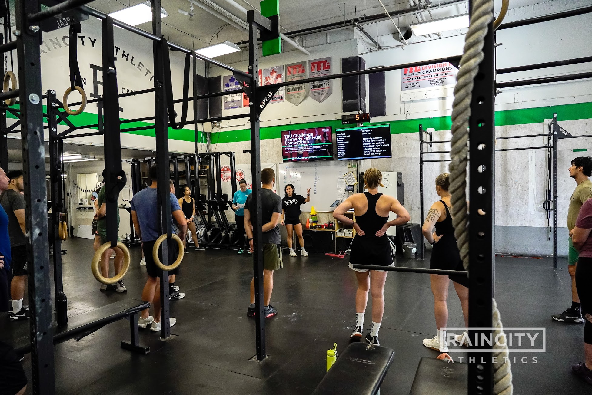 A small On-Ramp group learning to lift with a coach