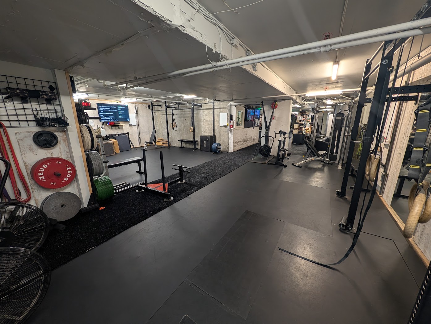 The Caves — bumper plates, fans and turf flooring