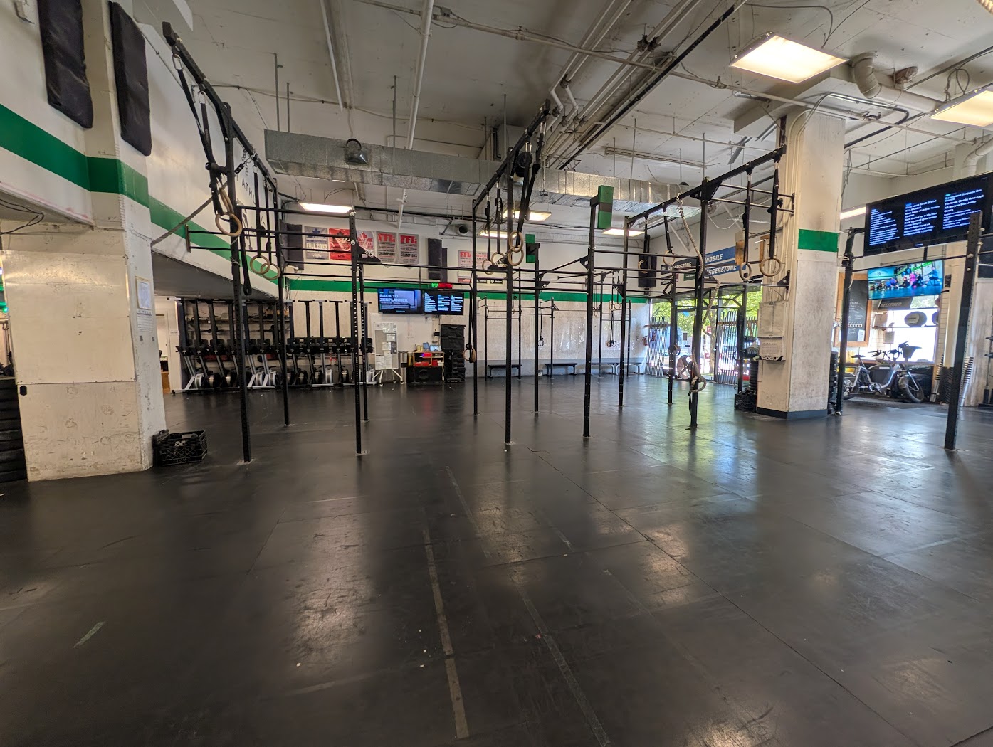 The Raincity Athletics open gym floor — rigs, racks, rings and ropes