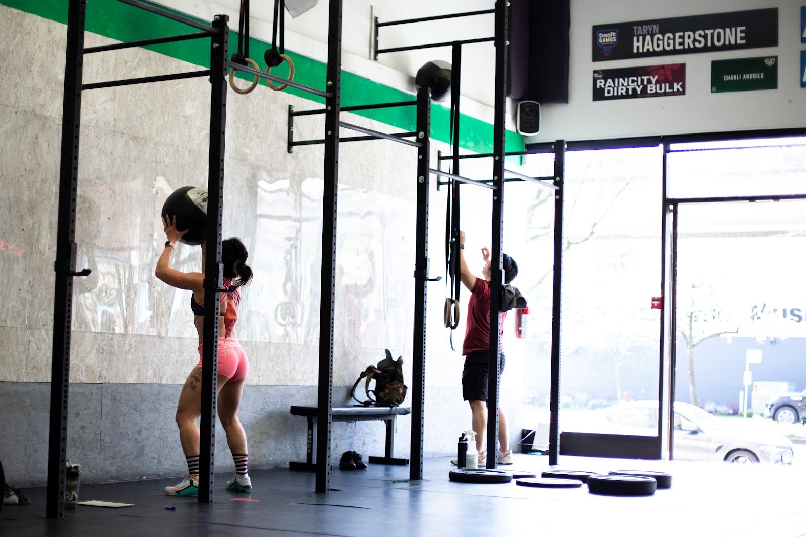 A class working through wall balls in a conditioning piece